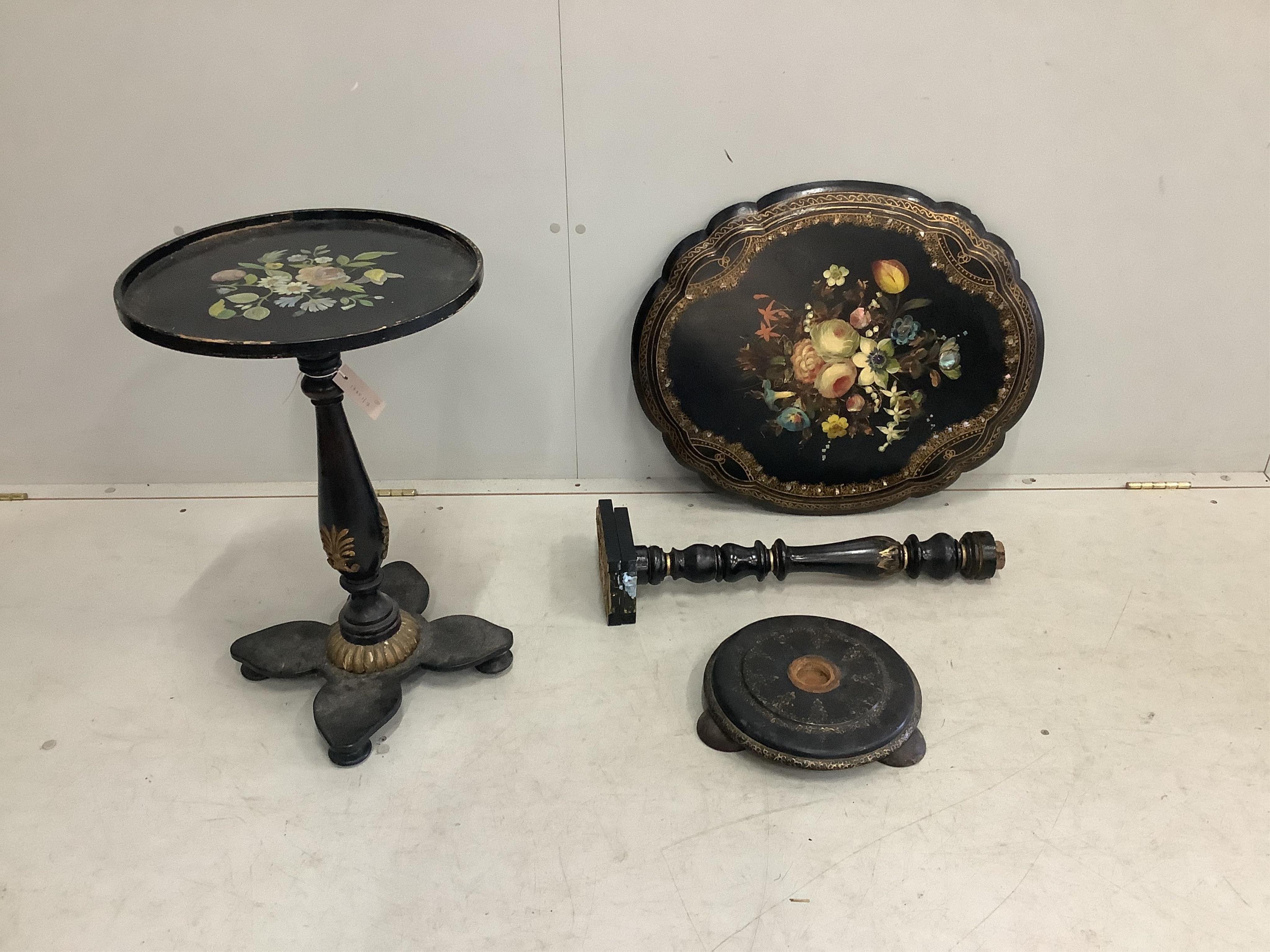 A Victorian oval papier maché tilt top wine table, together with a similar circular table.
